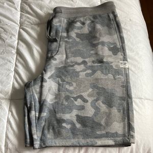 A NWOT pair of mens lounge / athletic shorts from Express in gray camo, size L.